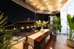 Balkón nebo terasa v ubytování MiaCasa Hanoi - King Bed - Free laundry - Netflix & Rooftop Chill