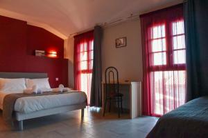 Postel nebo postele na pokoji v ubytování Hôtel du vieux pont