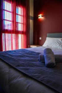 Postel nebo postele na pokoji v ubytování Hôtel du vieux pont