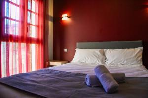 Postel nebo postele na pokoji v ubytování Hôtel du vieux pont