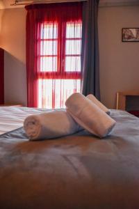 Postel nebo postele na pokoji v ubytování Hôtel du vieux pont