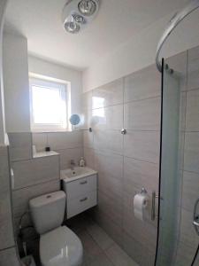 Kúpeľňa v ubytovaní Ubytovanie s kuchynkou