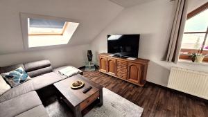 TV a/nebo společenská místnost v ubytování Apartmenthaus Kammblick