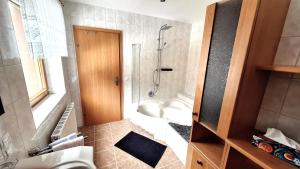 Koupelna v ubytování Apartmenthaus Kammblick
