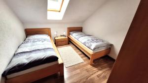 Postel nebo postele na pokoji v ubytování Apartmenthaus Kammblick