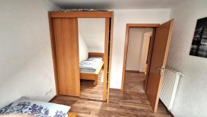 Postel nebo postele na pokoji v ubytování Apartmenthaus Kammblick