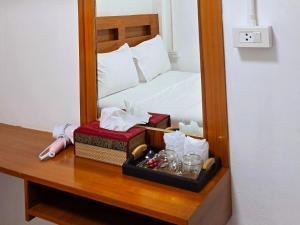 Postel nebo postele na pokoji v ubytování I Talay phuket