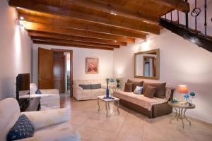 Posezení v ubytování Aris Cosy Casa