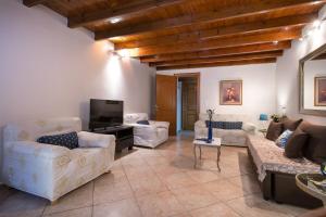 Posezení v ubytování Aris Cosy Casa