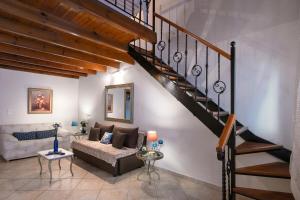 Posezení v ubytování Aris Cosy Casa