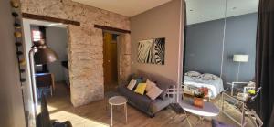 a living room with a couch and a table at ZARA in Menton
