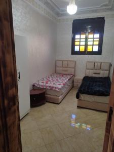 Una cama o camas en una habitación de BIOtorisme