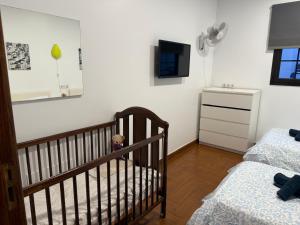 Posteľ alebo postele v izbe v ubytovaní LA CASITA DE BARTOLO