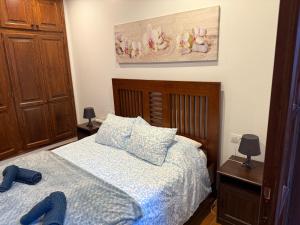 Posteľ alebo postele v izbe v ubytovaní LA CASITA DE BARTOLO