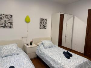Posteľ alebo postele v izbe v ubytovaní LA CASITA DE BARTOLO