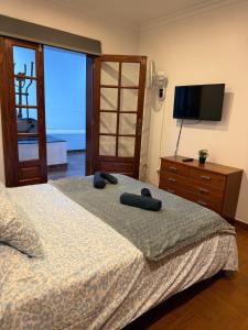Posteľ alebo postele v izbe v ubytovaní LA CASITA DE BARTOLO