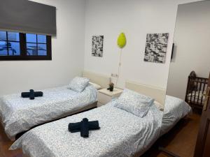 Posteľ alebo postele v izbe v ubytovaní LA CASITA DE BARTOLO