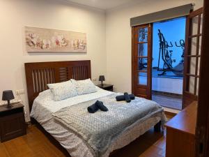 Posteľ alebo postele v izbe v ubytovaní LA CASITA DE BARTOLO