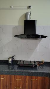 Cucina o angolo cottura di Chandru Residency