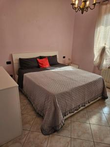 Postel nebo postele na pokoji v ubytování Agrati Residence