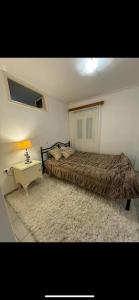 Postel nebo postele na pokoji v ubytování Beach House