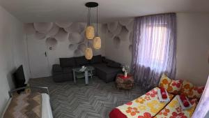 TV a/nebo společenská místnost v ubytování Ferienwohnung Landliebe