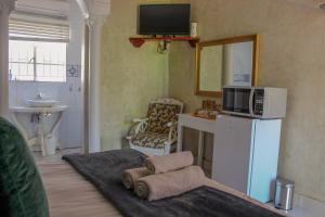 A kitchen or kitchenette at The Fountain Villa