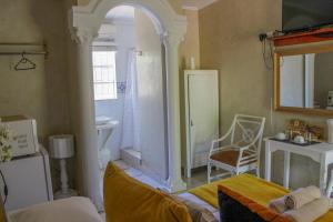 A kitchen or kitchenette at The Fountain Villa