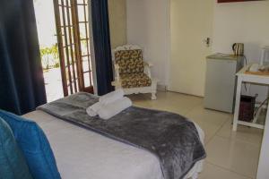 A bed or beds in a room at The Fountain Villa