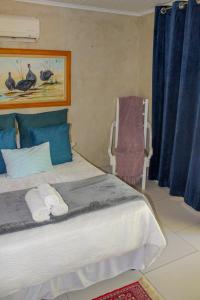 A bed or beds in a room at The Fountain Villa
