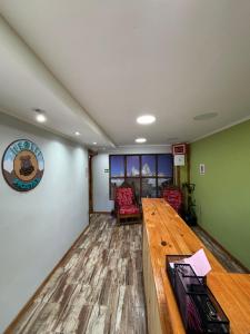 TV a/nebo společenská místnost v ubytování Hostal Leolei