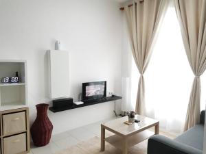 Televisyen dan/atau pusat hiburan di myuu homestay