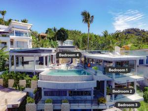an aerial view of a mansion with descriptions of the house at Paradise Villa Elysium - Sea View Infinity Pool with Waterfall & Jacuzzi in Koh Samui 