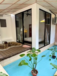 a house with a pool in the middle of a room at Ardour Lodge "B" Wing in George Town