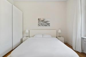Rúm í herbergi á Spacious & Tranquil Rooms in Limpertsberg