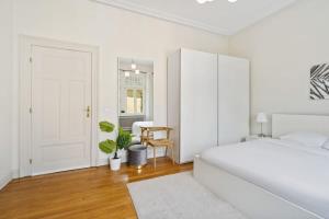 Rúm í herbergi á Spacious & Tranquil Rooms in Limpertsberg