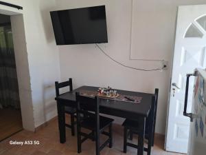 TV a/nebo společenská místnost v ubytování Departamentos Fuentes
