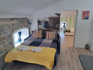 Letto o letti in una camera di The way to trieste bikes storage