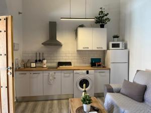 Kuchyňa alebo kuchynka v ubytovaní La Parra Apartamento