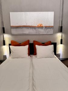 Una cama o camas en una habitación de Parko rezidencija apartments II - SELF CHECK-IN