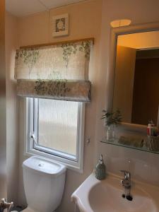 Et badeværelse på 5 the green,lilliardsedge holiday park