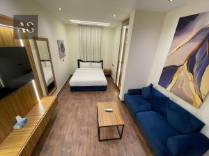 Postel nebo postele na pokoji v ubytování Elite Boutique Hotel