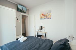 Krevet ili kreveti u jedinici u objektu Studio Apartment & Rooms Huang