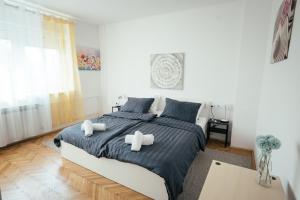 Krevet ili kreveti u jedinici u objektu Studio Apartment & Rooms Huang