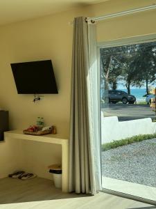 TV a/nebo společenská místnost v ubytování Sunvada Beach Rayong