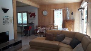 Posezení v ubytování CHALET AU CALME à GERARDMER