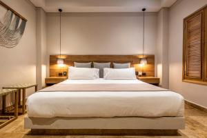 Postel nebo postele na pokoji v ubytování Casa Cascabel By Soho