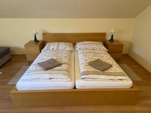 Postel nebo postele na pokoji v ubytování Bystra 150