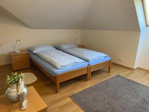 Postel nebo postele na pokoji v ubytování Bystra 150