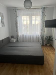 Posteľ alebo postele v izbe v ubytovaní Pokoje u Asi